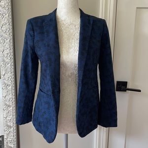 Dark blue blazer, floral print, lined.